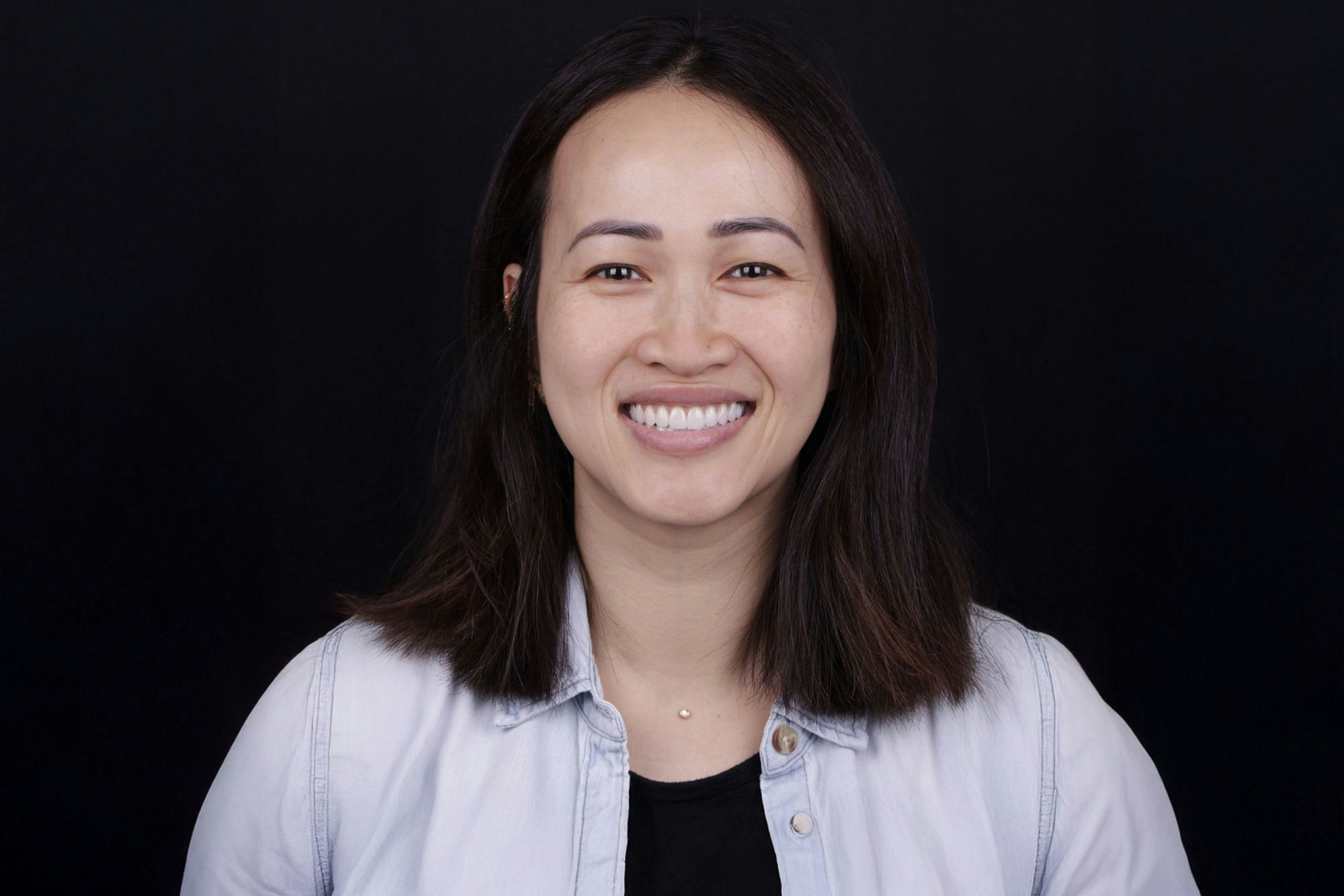 Patient smiling after cosmetic dentistry at Oh Aesthetic Dentistry in Los Angeles
