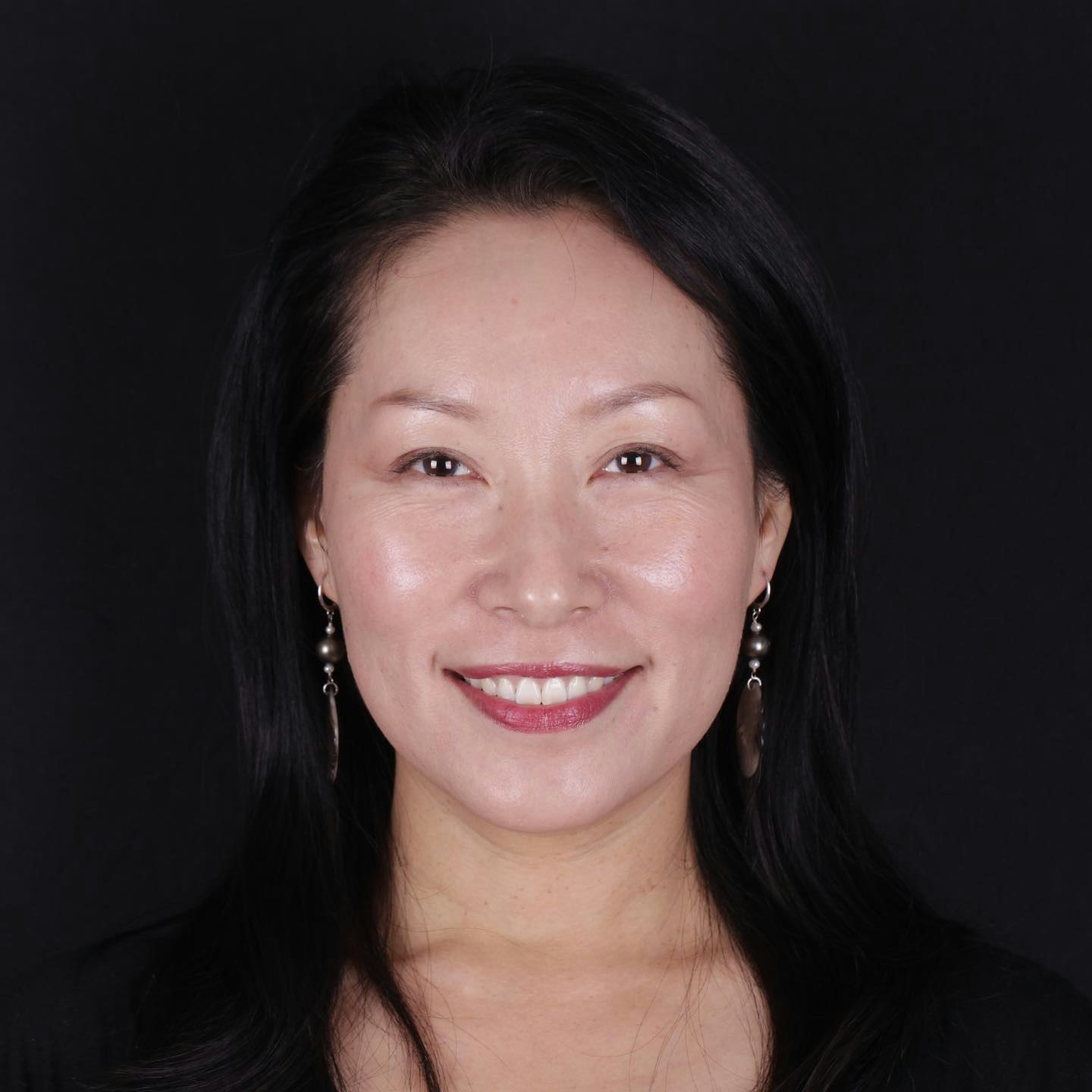 Invisalign patient smiling after treatment at Oh Aesthetic Dentistry in Los Angeles